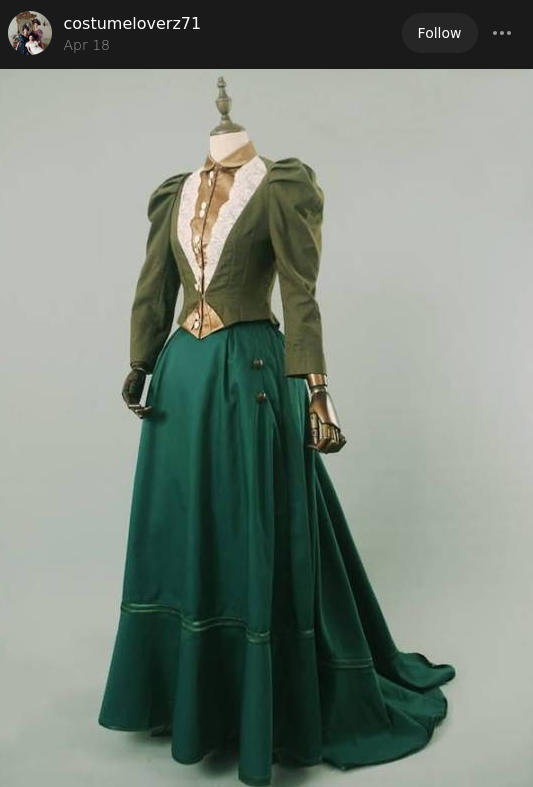 a mannequin wearing a Victorian dress with what looks like a candlestick for a head and brass or maybe wooden articulating hands